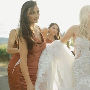 Rust colored satin slip dress with cowl neckline! Perfect for fall weddings!